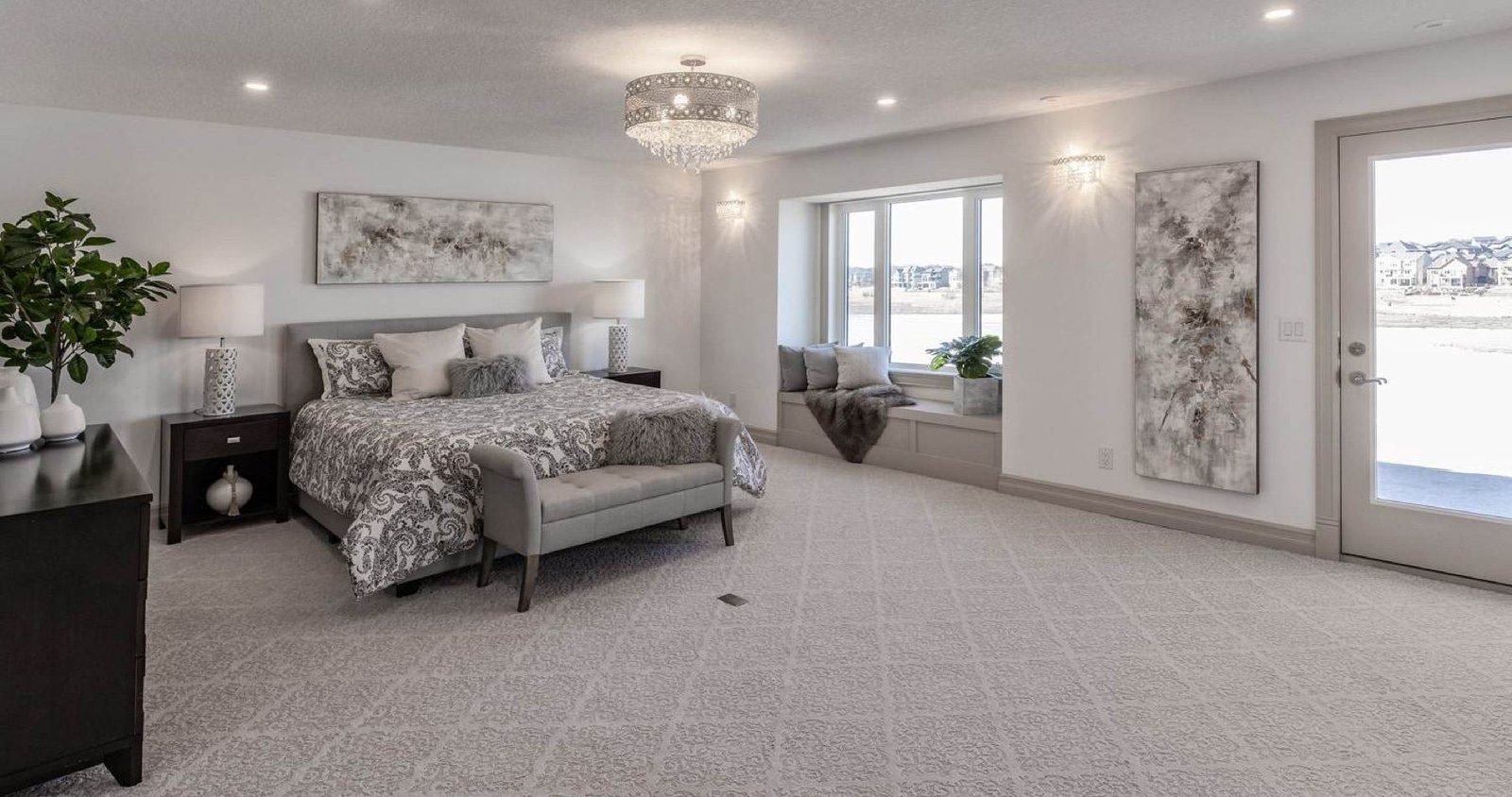 Lake-view primary suite in Kay2's award-winning Chestermere renovation