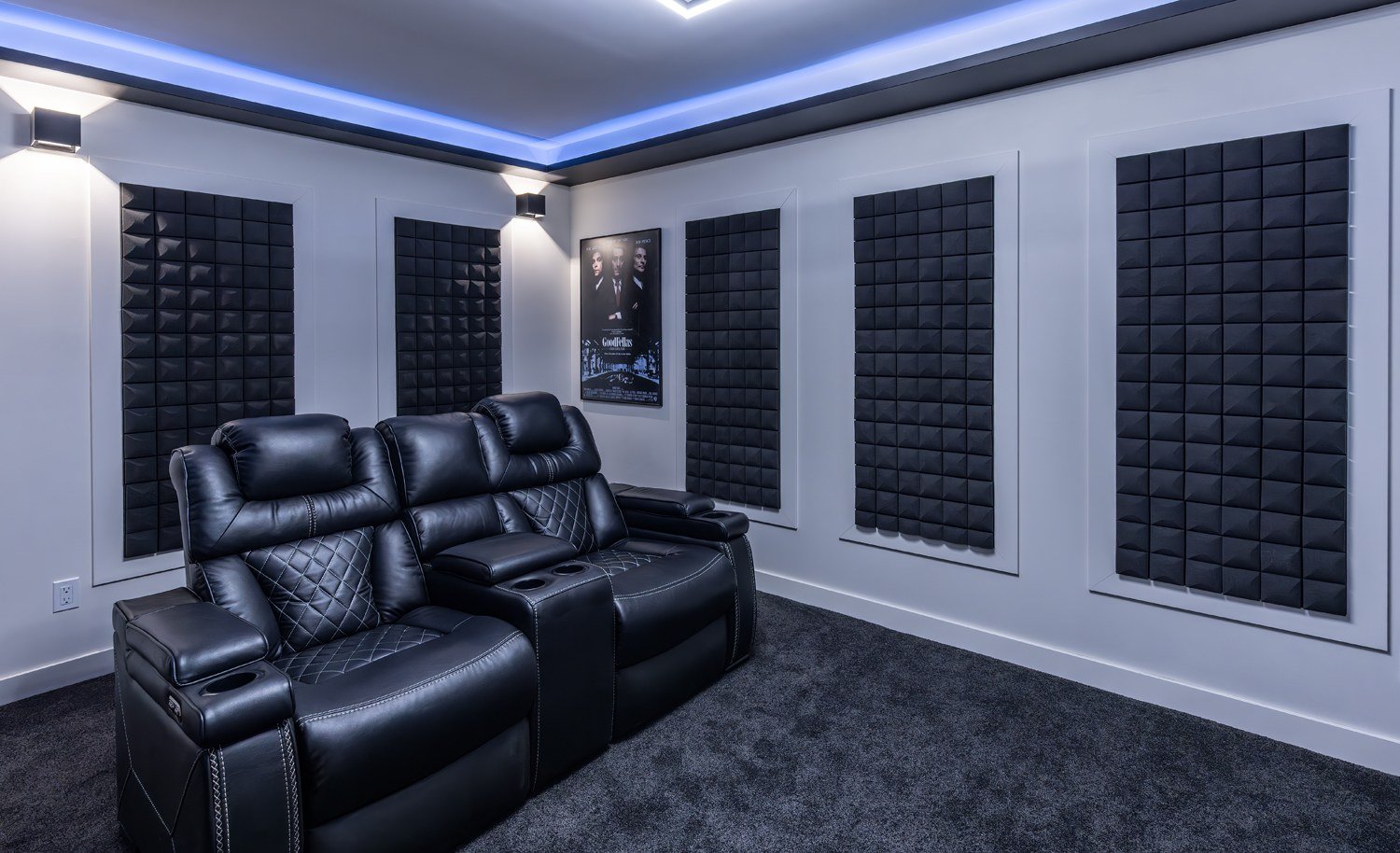 Home theatre display with acoustic panels and recliners at the Kay2 Showroom